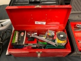 Red metal Tool Box full of Building Supplies
