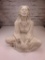 White Plaster Statue of Sitting Native American Girl