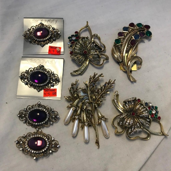 Lot of 8 Gold-Toned Brooches with Colorful Stone Accents and Embellishments