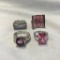 Lot of 4 Sterling Silver Rings with Pink or Purple Center Gems