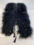 Woman's black fur vest with faux leather