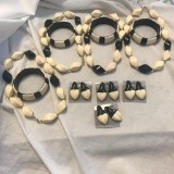 Lot of 4 Identical Black and White Necklace, Bracelet, and Earring Sets