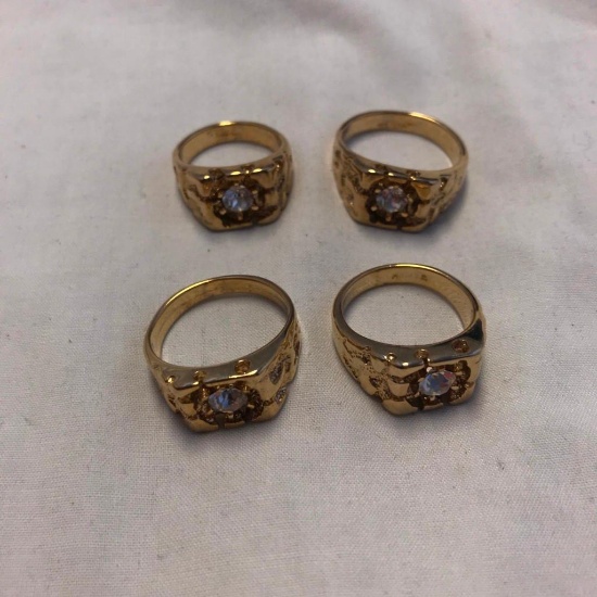 Lot of 4 Identical 14 KT Gold Electroplated Rings with Center Gems