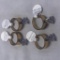 Lot of 4 Identical Cubic Zirconia Rings with Gold-Toned Bands
