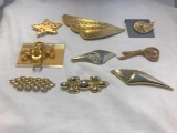 Lot of 9 Gold-Tone Brooches