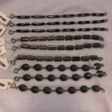 Lot of 9 Similar Style Black and Silver-Toned Bracelets