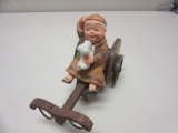 Asian Figurine of a Man with a Dog on a Cart