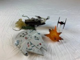 Lot of toy figures with Star Wars millennium falcon