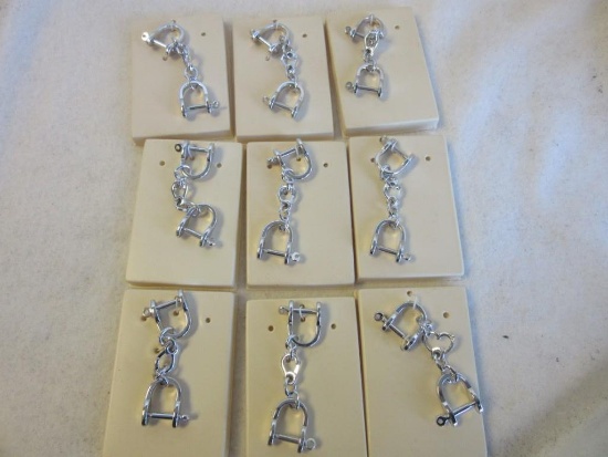 Lot of 9 Identical Silver-Toned Western Handcuff Keychains