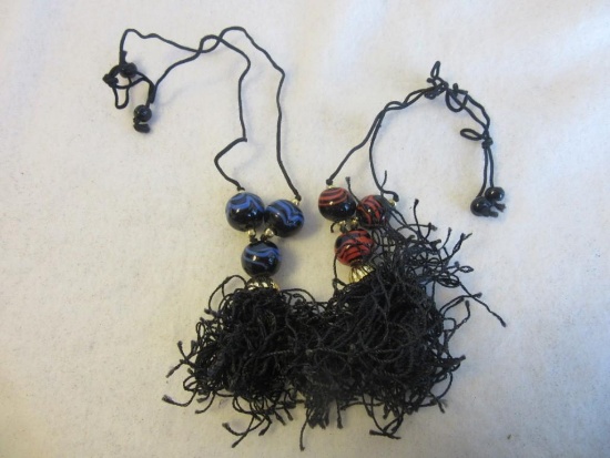 Lot of 2 Similar Red, Blue, and Black Costume Necklaces