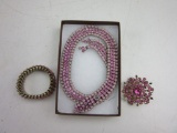 Set of Pink Crystal Necklace, Bracelet, and Brooch in Box