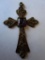 Bronze cross pendant with amethyst-colored stone