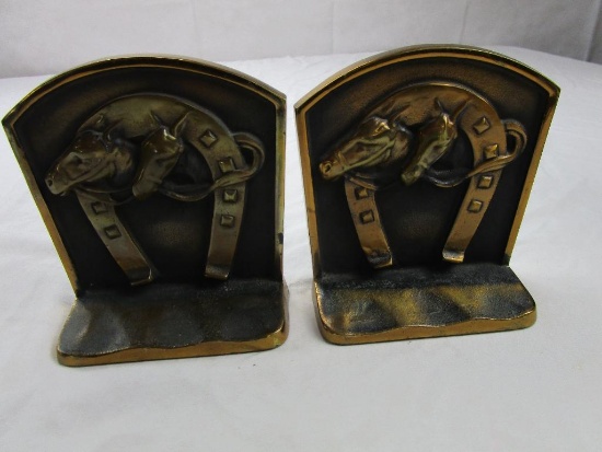 Pair of vintage brass and copper horse and horse shoe book ends