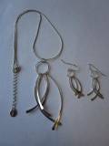 Silver-tone necklace, pendant and pierced earring set by Icing. Chain is 14