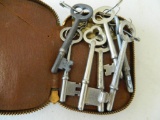 antique leather key holder and 7 antique skeleton keys not reproductions