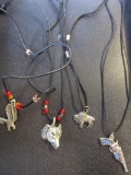 Lot of 4 metal charm and beaded necklaces on fabric rope: Eagle, Wolf, Bison, and Pistol