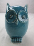 Decorative turquoise-color ceramic owl statuette