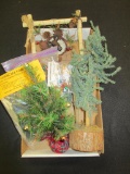 Box lot of miniature Christmas dollhouse items and a holiday moose wall hanging