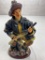 Fireman holding a hose figure fabric type material