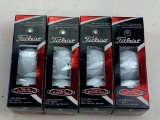 Lot of 12 Titleist Tour Prestige Golf Balls in the boxes. 4 boxes with 3 golf balls per box