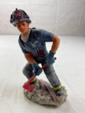 Fireman holding a red Ax plastic figure