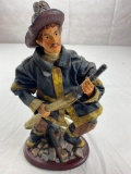 Fireman holding a hose figure fabric type material
