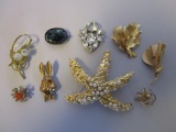 Lot of 9 costume jewelry brooches