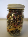 Glass jar filled with beads and jewelry parts and pieces for crafts or jewelry making 5