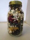 Glass jar filled with beads and jewelry parts and pieces for crafts or jewelry making 7