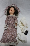 Old Unmarked Girl Doll. Eyes Open and Close with cloths