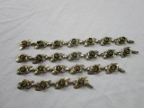 Lot of 4 silver-tone and rhinestone floral motif costume jewelry bracelets