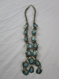 Silver-tone metal and synthetic turquoise stone Native American squash blossom necklace