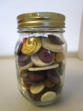 Glass jar filled with buttons 5