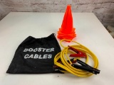 A set of Jumper Cables and lot of orange Safety Cones