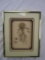 Triple matted shadow box wall art with sea shells in a gold-tone frame