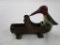Vintage cast iron and brass woodpecker toy