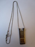 Art deco-style pendant tested silver pendant with artist's mark. 8.24g TW