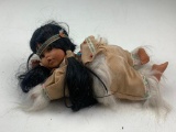 Native American Child Crawling porcelain doll with outfit by Cathay Collection