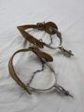 Pair of genuine spurs with adjustable leather boot straps