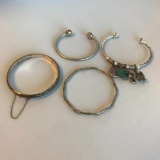 Lot of 4 Misc. Silver Toned Bangle Costume Bracelets