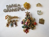 Lot of 6 brooches and a pendant: Grandma, Christmas, floral, and heart