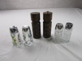 Lot of 3 salt and pepper shakers: wood, floral, and cut glass.
