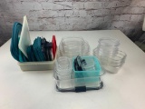 Lot of plastic food storage containers with lids
