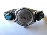 Ladies Timex wristwatch with silver and turquoise band clasps 32.17g TW