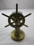 Miniature brass ship's helm-theme compass