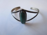 Old pawn-style by Circle JW sterling cuff bracelet with green tiger's eye stone. 11.14g TW.