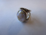 925 ladies ring with iridescent stone made in India artist mark CL Sz. 7.5. 12.16g TW.