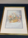 Framed Print of a Basket of Flowers