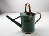 Green metal 1 gallon garden watering can with copper handles