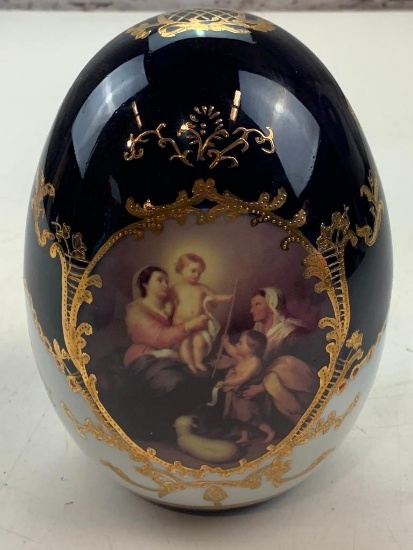 vintage porcelain egg with mother and children scene